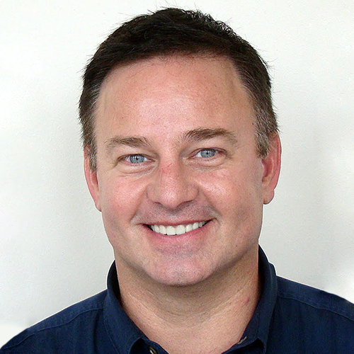 A team of people working together to fix a damaged home